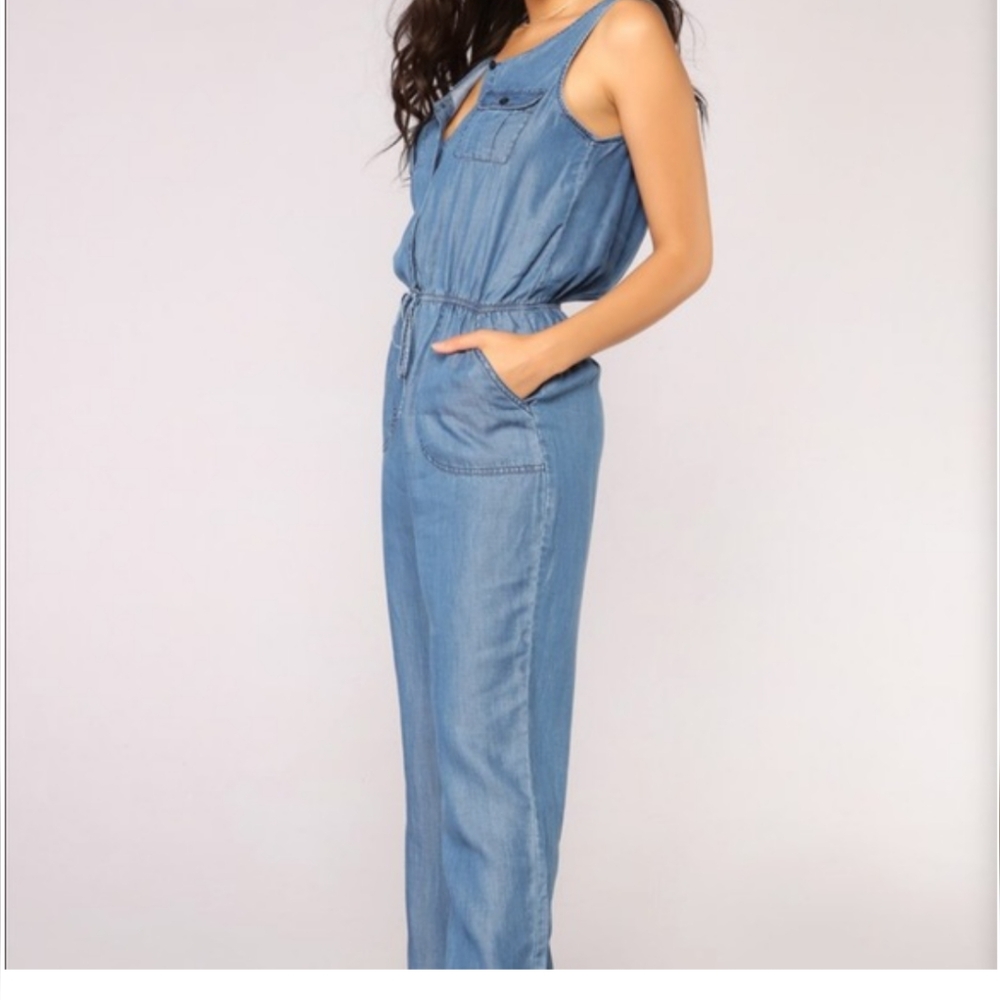 Light lightweight Jean material jumpsuit size small NWT